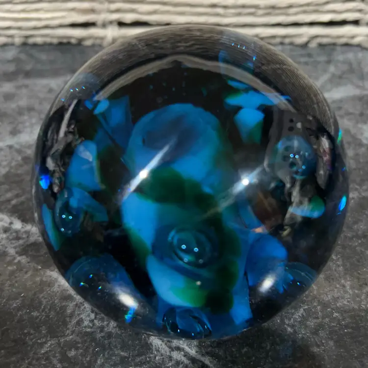 Dark And Moody Cobalt Blue With Light Blue And Green Trumpet Flowers With Controlled Bubble Centers.