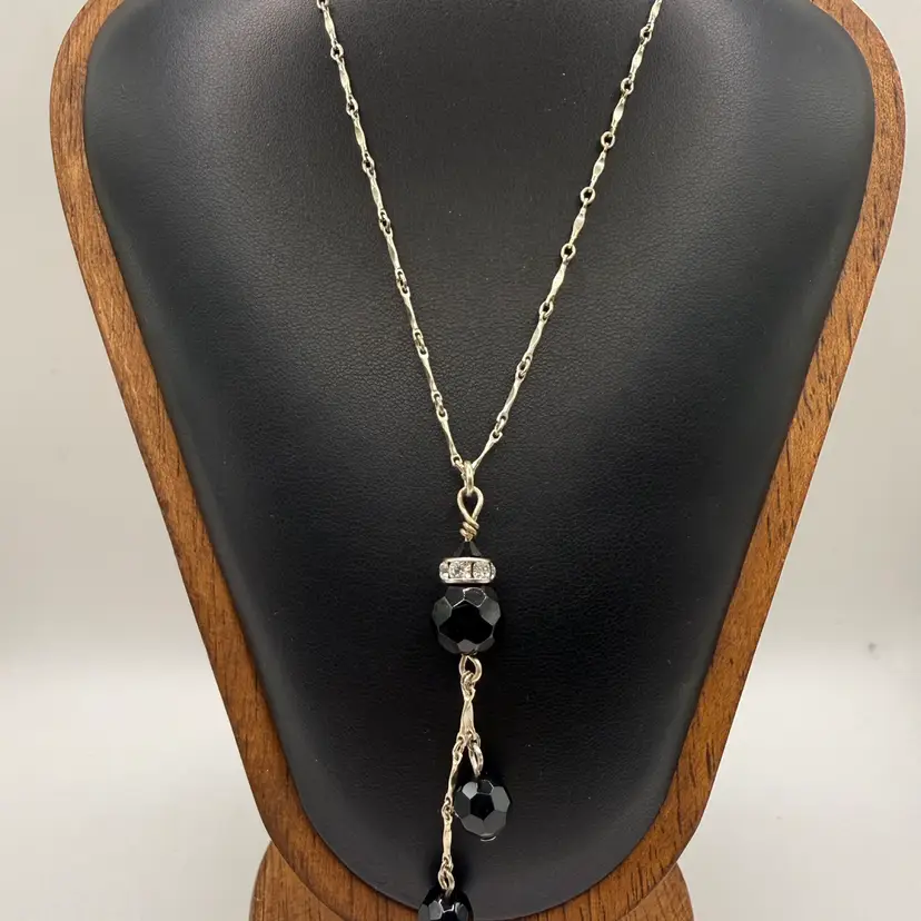 vintage sterling silver chain necklace features faceted black jet glass beads and a Y-drop design