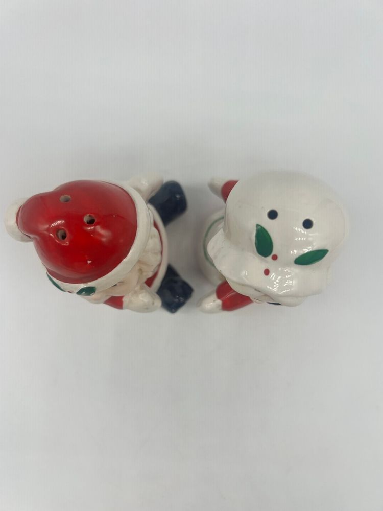 Vintage Ceramic Hugging Santa & Mrs. Claus S&P Set