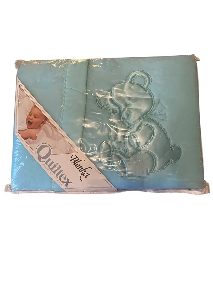 vintage baby blanket made by the brand Quiltex Blue New In Package