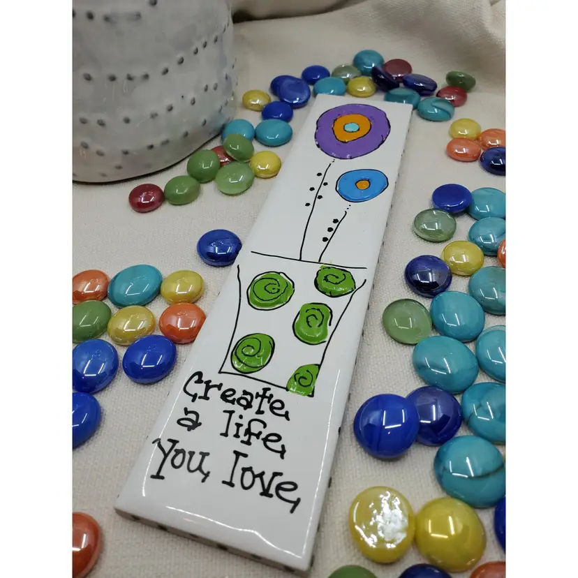 CREATE A LIFE YOU LOVE
Whimsical Handpainted Flowers On Italian Tile 2.25" X 9.75" Ready To Hang Signed By Artist