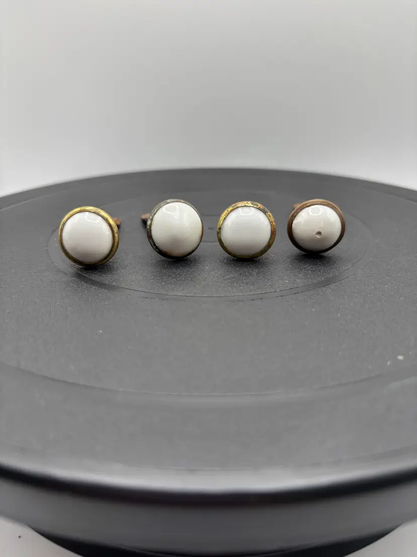 Porcelain nail head covered nails