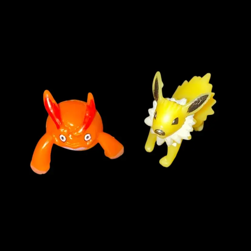 #32- Two Pokémon Figures As Pictured