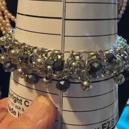 Silver Toned Bracelet With Blue Stones Dangles