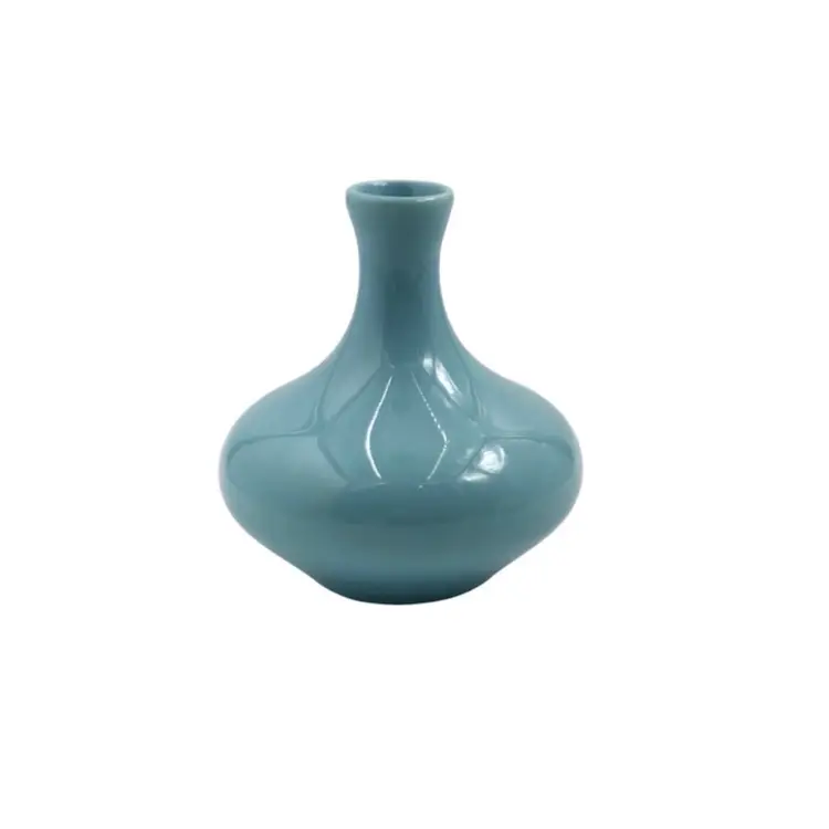 ROYAL HAEGER VINTAGE 
POTTERY BUD VASE 
By Stamped Hallmark
Aqua Blue Weed Pot