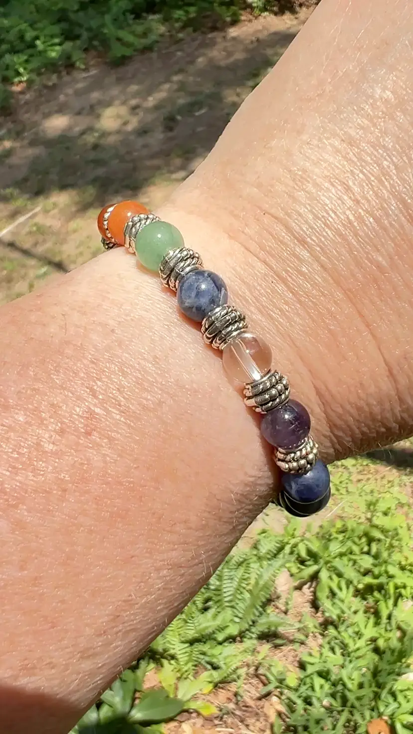 7 Chakra 8mm Beads Rainbow Bracelet. 6-3/4" to 7-1/4” Stretch With Tree Of Life Charm.