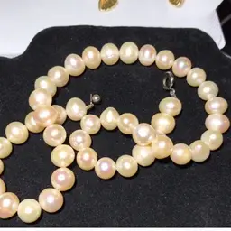 146. 28” Real Pearl Signed Piece