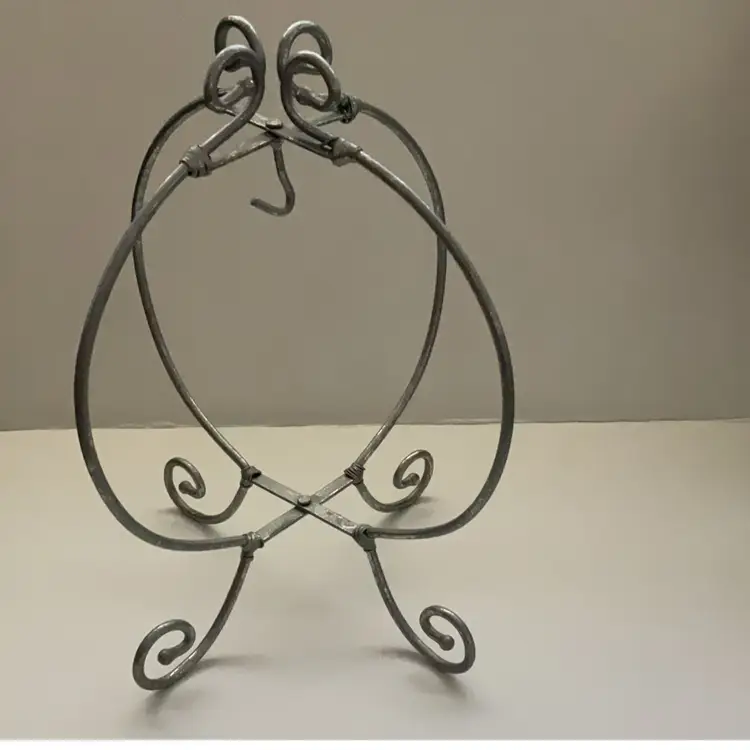 Silver Colored Teacup And Saucer Display