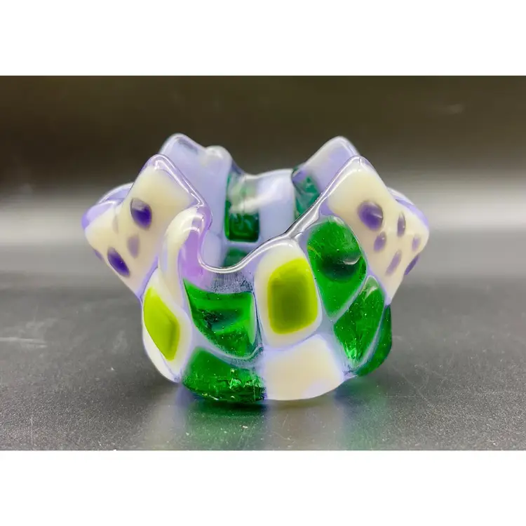 Fused glass handkerchief votive cup or small planter.  Greens, purple and white glass
