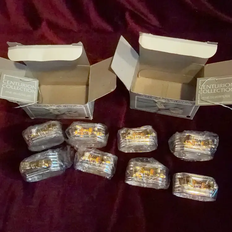 Vintage Centurion Collection Napkin Rings silver gold tone Silverplate 2 Sets Of 4.  Still in original packaging!