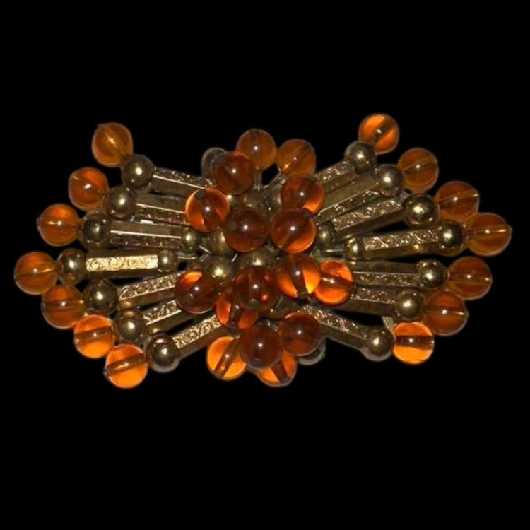 Vintage Gold tone with Amber beaded brooch
Plastic backing 3.5” X 2”