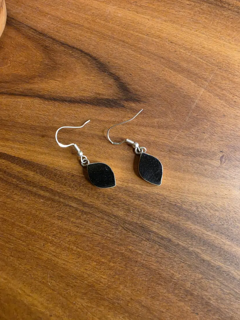 Pair of Jade earrings in sterling silver settings.