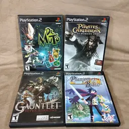 PlayStation 2 Game Lot of 4 – Dr. Muto, Phantom Brave, Gauntlet, Pirates