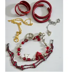 Lot Of 7 pieces of Vintage Red Jewelry - 2 Pair Red Enamel Hoop Earrings - 1 Artisan Bead Charm Bracelet - 1 Japanese Red Rhinestone Bracelet - 1 Gold Tone Heart Belly Teddy Bear Necklace 16” -1 Silver tone Heart Necklace 18” - 1 Stretch Red & Silver Tone Bead Bracelet