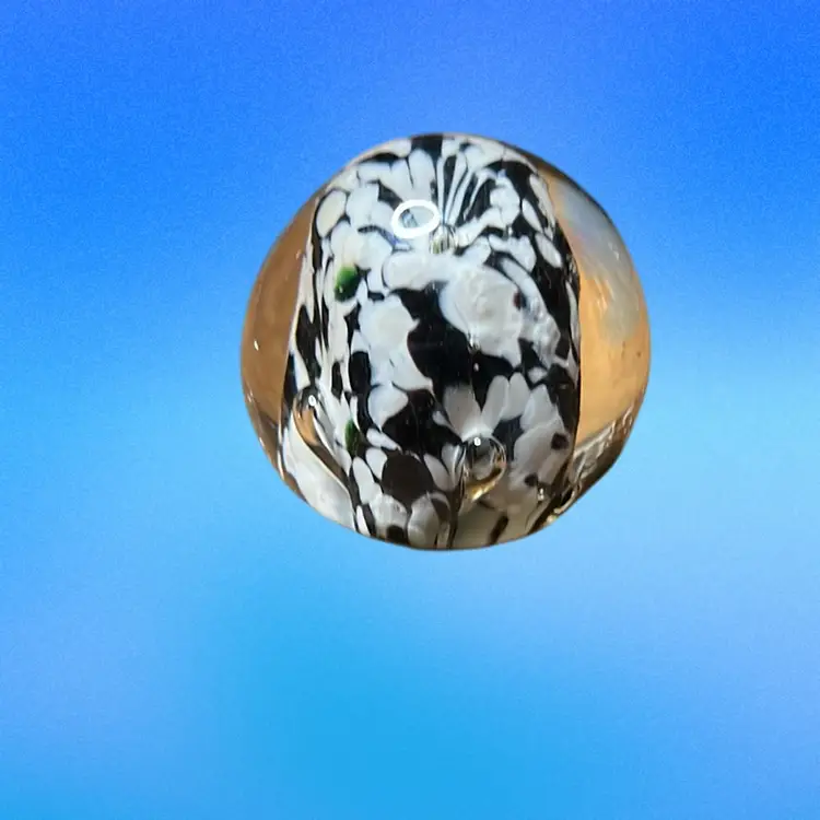 02. Hold your paper set of three paper weights.