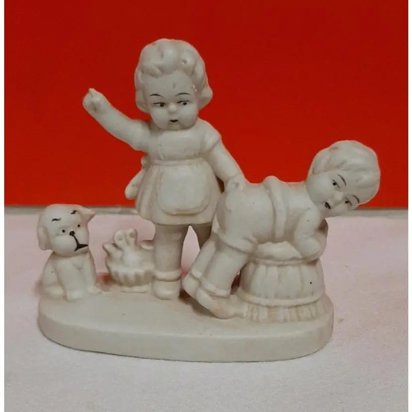 RARE Antique German Bisque Figurine - "Sewing A Patch Onto Her Brothers Shorts"