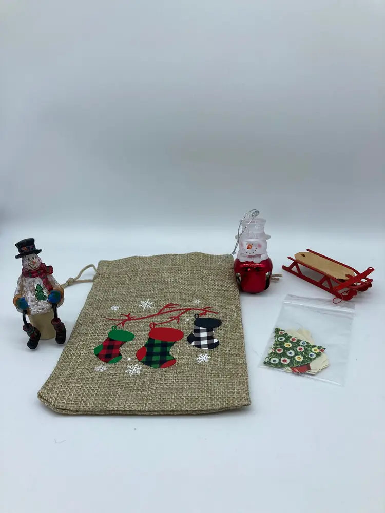 Sack of goodies: Snowman cork, snowman bell, Vintage Christmas Tree Stickers, Small Sled, and decor Bag