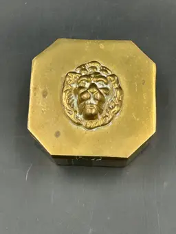Vintage heavy breast trinket box with lion’s head on top