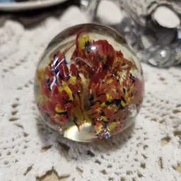 red yellow black paper weight