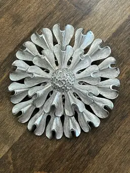 Vintage Textured Monet Silvertone Flower Brooch