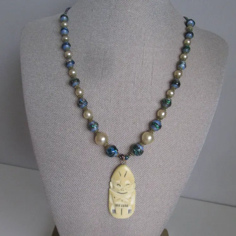 Antique Billiken Pendant with Blue and Ivory Beaded Necklace