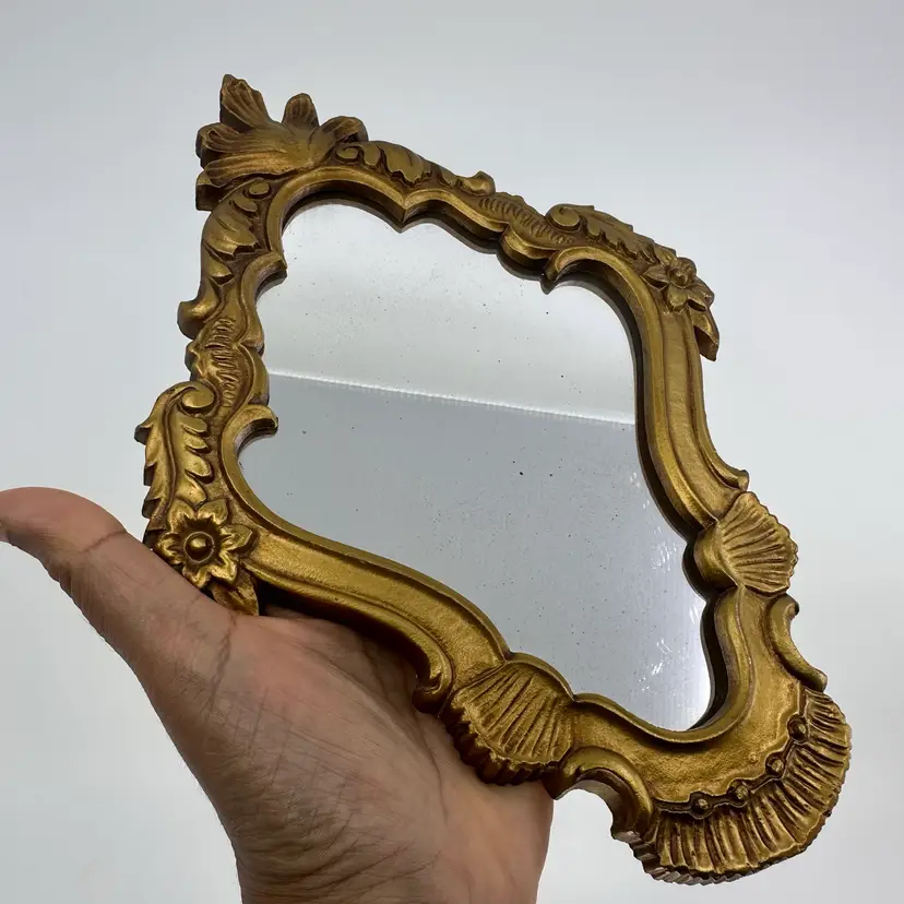 Small Ornate Brass Colored Framed Mirror