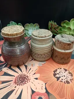 Three Signed Corked Studio Pottery Jars.