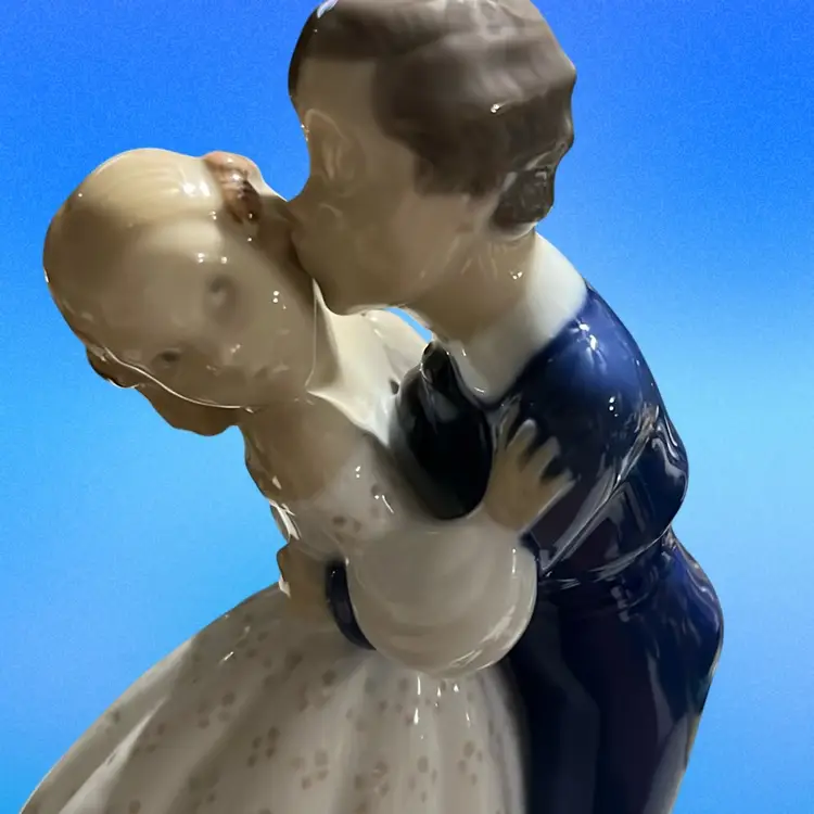 MCM Bing & Grøndahl porcelain figurine #2162 "Youthful Boldness. First Kiss." Merged With Royal Copenhagen In 1985. Numbered 7.5” Tall Excellent Condition Made In Denmark Valentine Day