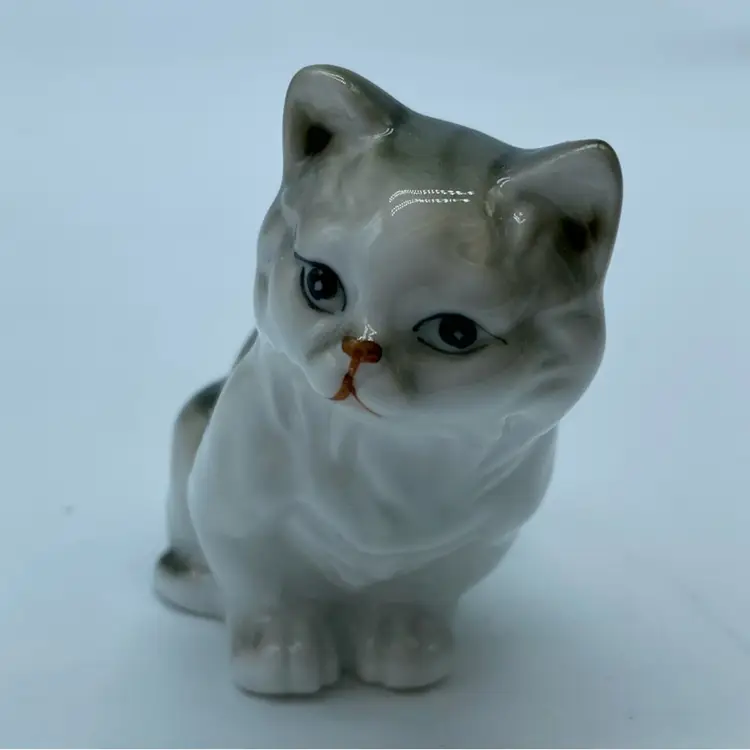#1403 Porcelain cat figurine, made in Japan.