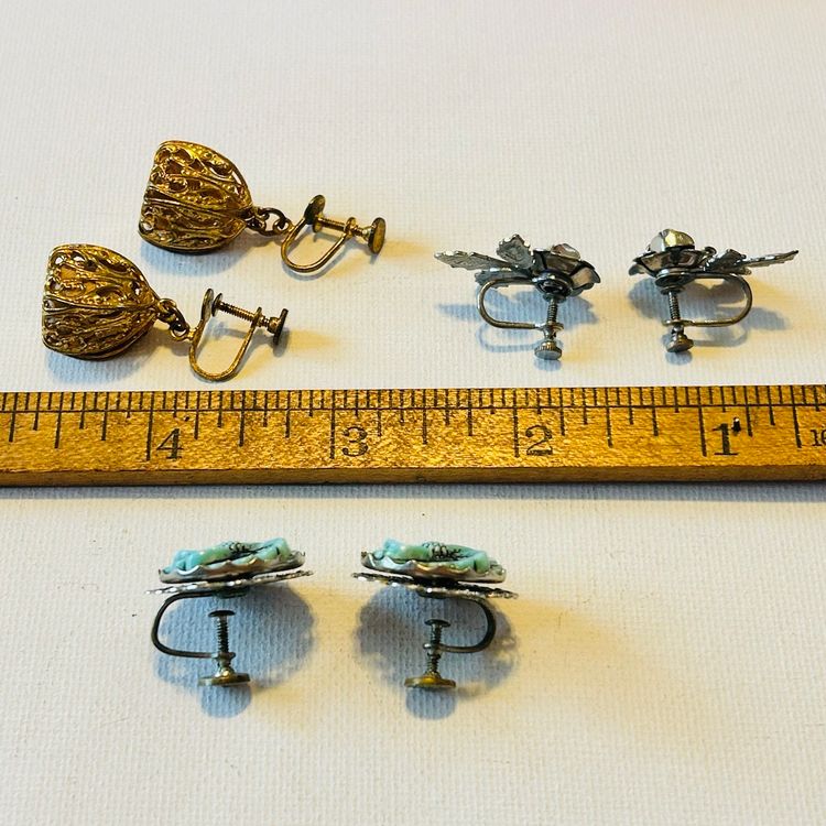 Set Of Three Vintage Unsigned Screwback Earrings - Gold Tone Filigree Dangle, Silver Tone Textured Rose, Silvertown Filigree Carved Acrylic