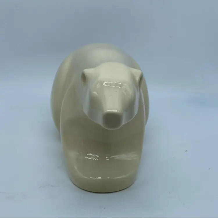 #1410 Signed mid-20th century Canadian Northern Pottery ceramic polar bear figurine.