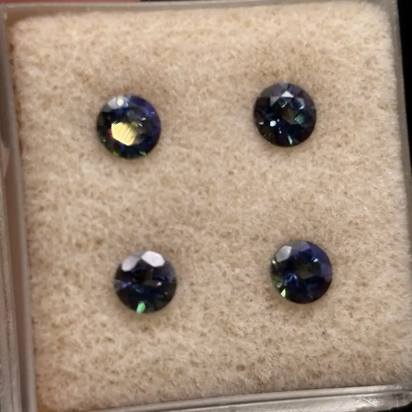 040 Spectrum Topaz- 4mm Round - 4 pcs 1.20ct.