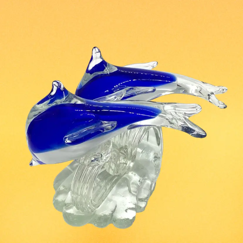 Glass Dolphins In Waves