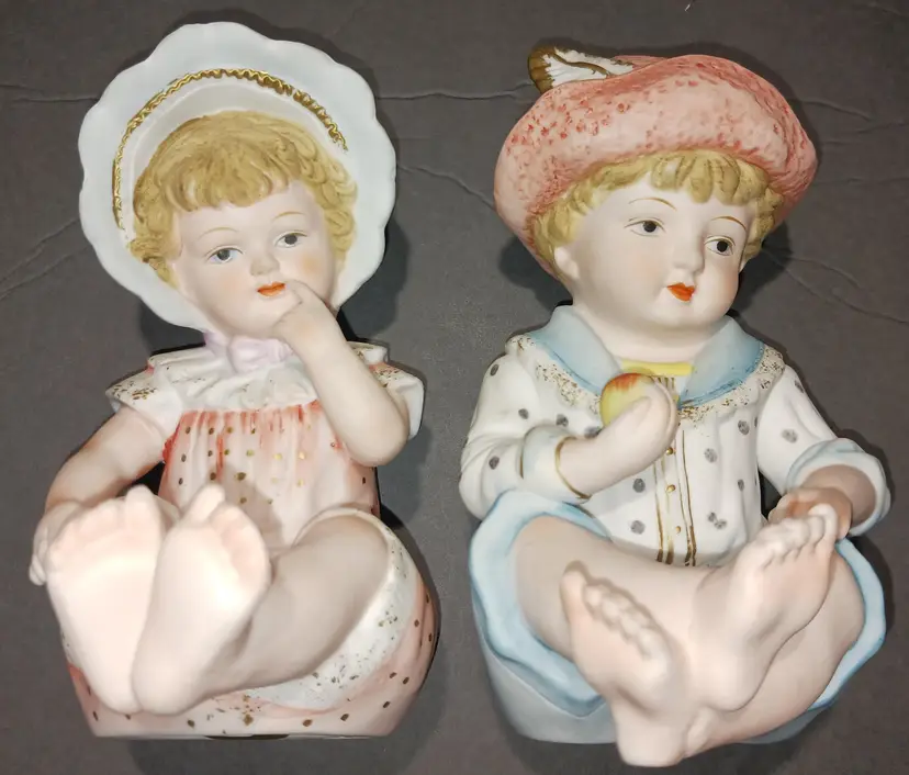 Pair of Vintage Porcelain Piano Baby Figurines