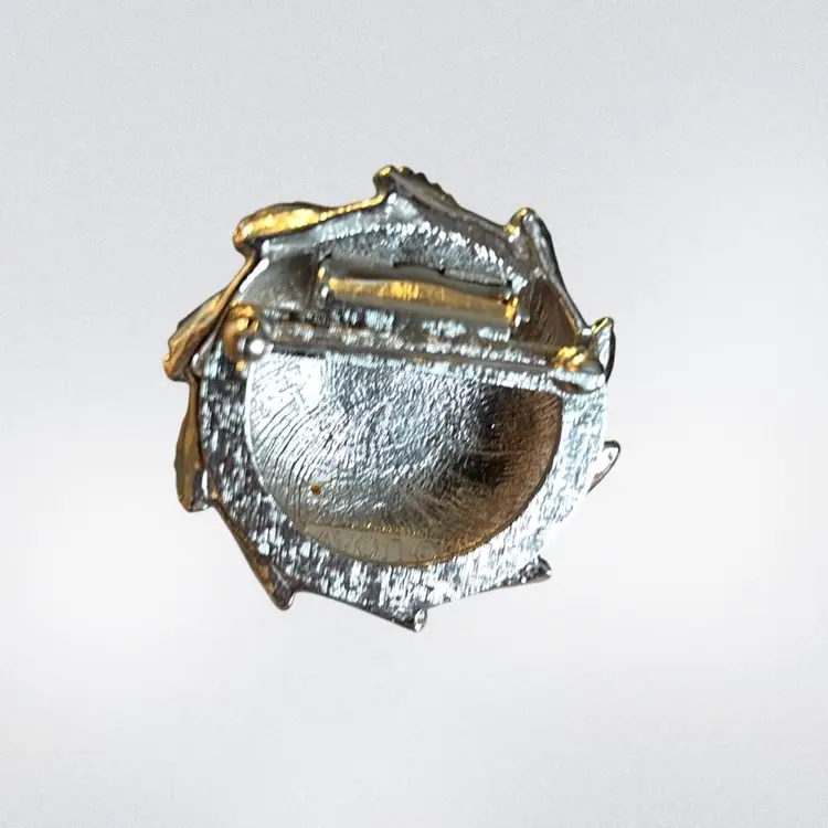 Vintage Avon Silver Tone   Blue Enamel Silver Tone Swirl Round Light Reflective Cab In Center