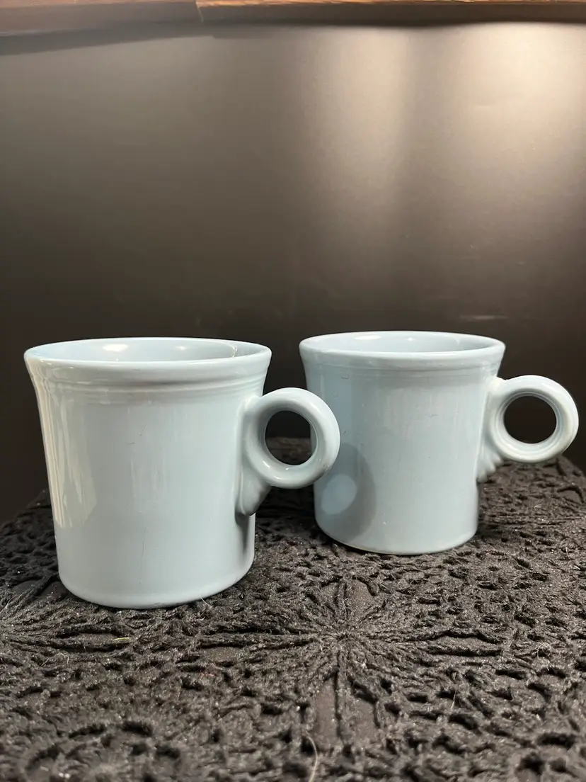 A Pair of Vintage HLC (Homer Laughlin USA) Fiesta USA.  Tom & Jerry O Ring Light Blue Mugs