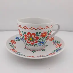 Vintage handpainted cup and saucer
