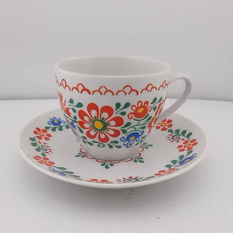 Vintage handpainted cup and saucer