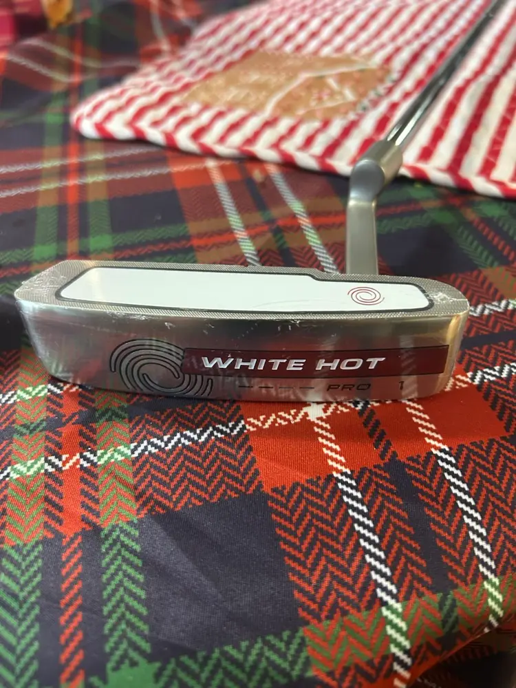 New In Plastic Odyssey White Hot Pro Blade Putter 34” With Superstroke Grip And Headcover.