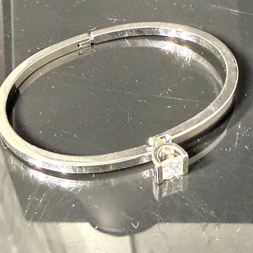 NOS RJ Graziano Silver Tone Bezel Set Single Rhinestone Cuff Hinged Bangle