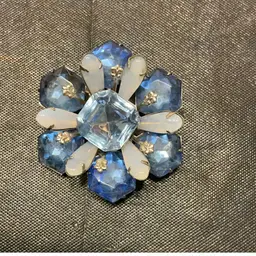 Floral Brooch With Clear And Blue Rhinestones And Moon glow Stones.