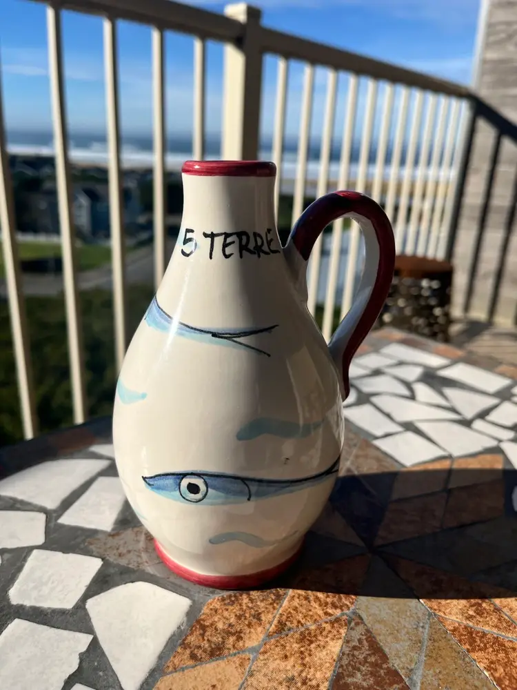 Vintage Made in Italy oil bottle with sardines as decoration. Missing cork/ Spout