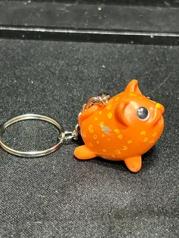 Orange Leopard Chubby Puppies Keychain