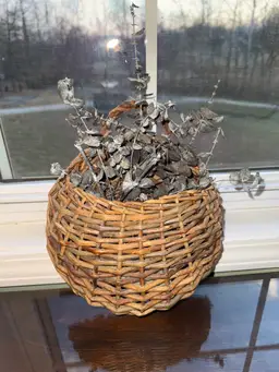 Vintage Woven Wicker Wall Pocket Hanging Basket with eucalyptus; country decor