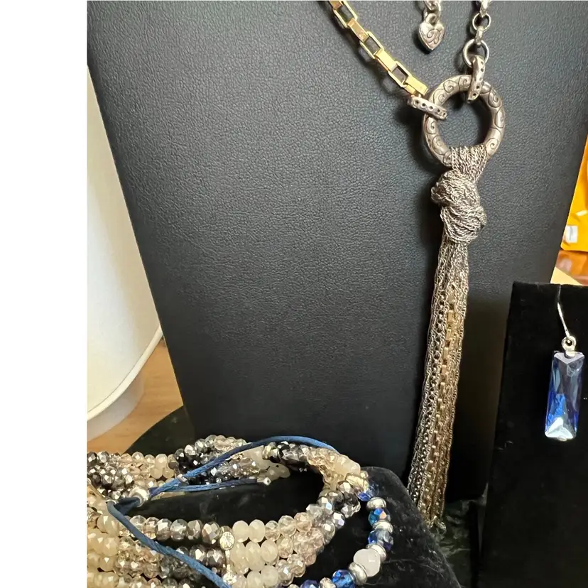 Blue Baby Combo,4 Piece Curated Jewelry Set: 
-Pierced Silver Hook Blue Crystal Dangle Earrings 1”, Belk Brand Silver Plated
- Two Sparkly, With A Hint Of Blue, Bracelets,Unknown Makers Adjustable And Stretchy, Great Condition
-Gorgeous Brighton Jewelry-Silver And Gold tone 30”Chain With Statement Gold And Silver Mixed tone Tiny Chains-like Pendant, 5” Long! Dress It Up Or Down… Versatile! See Pictures