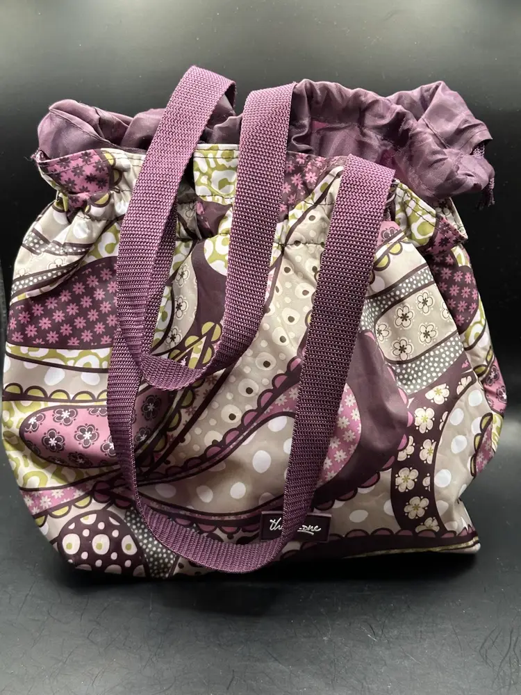 Thirty-One Thermal Cinch-Top Lunch Tote, featuring a purple paisley pattern.