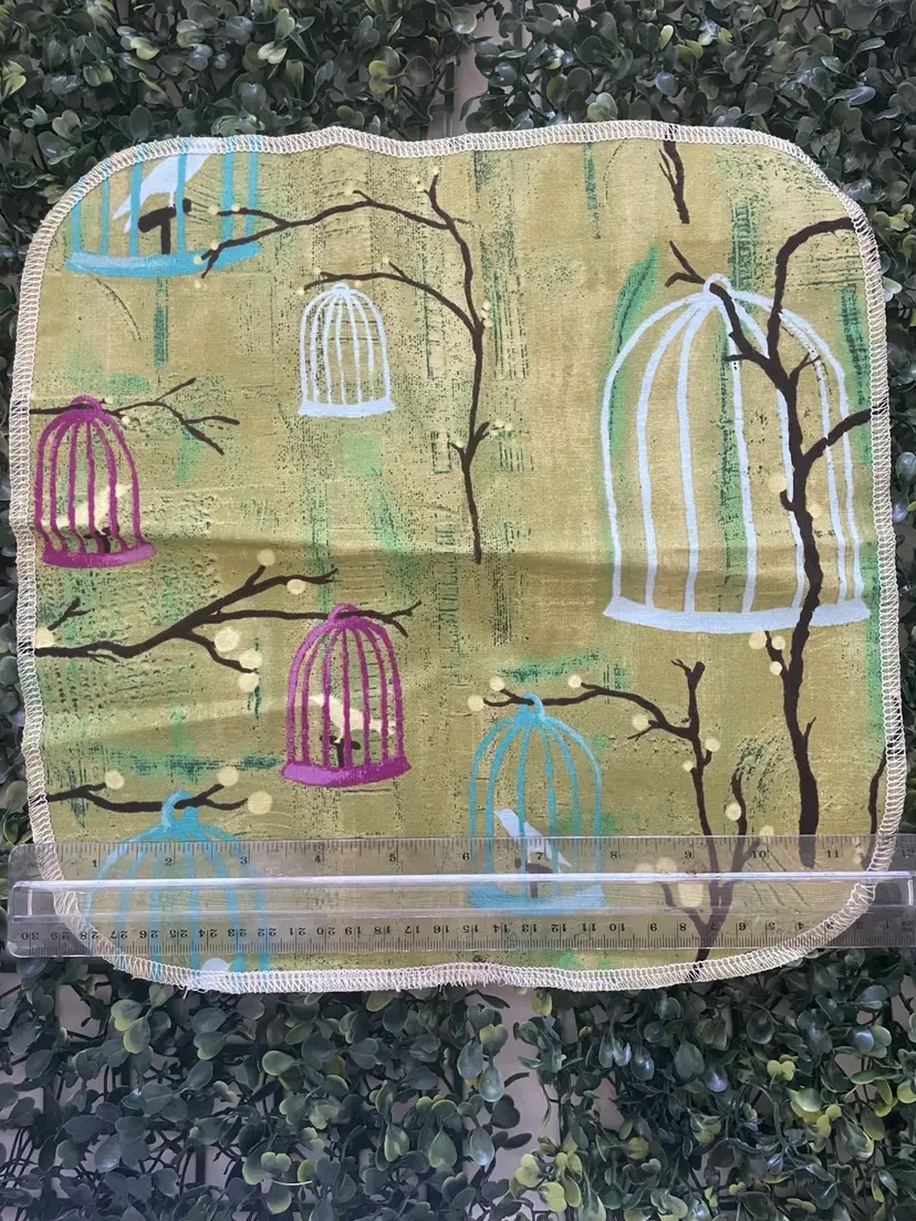 Set of six cloth napkins with birds on them