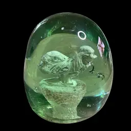 Rare Victorian green glass "dump" paperweight with a sulphide cockerel (rooster) inclusion.