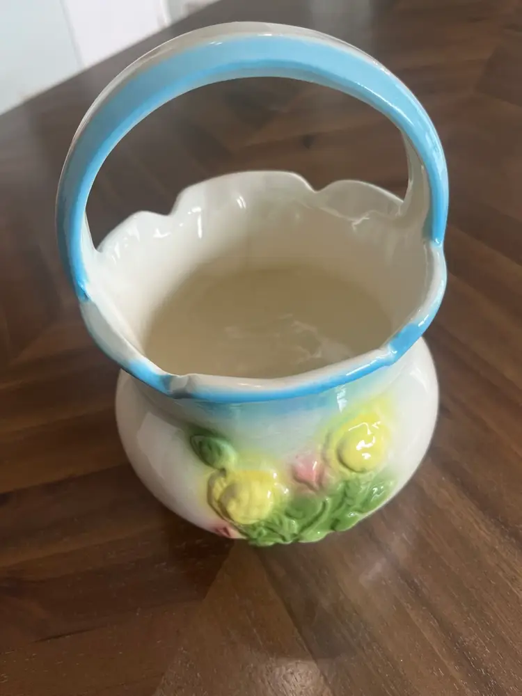 Vintage Ungemach Pottery ceramic basket planter with floral motifs. 8” H X5.5” W