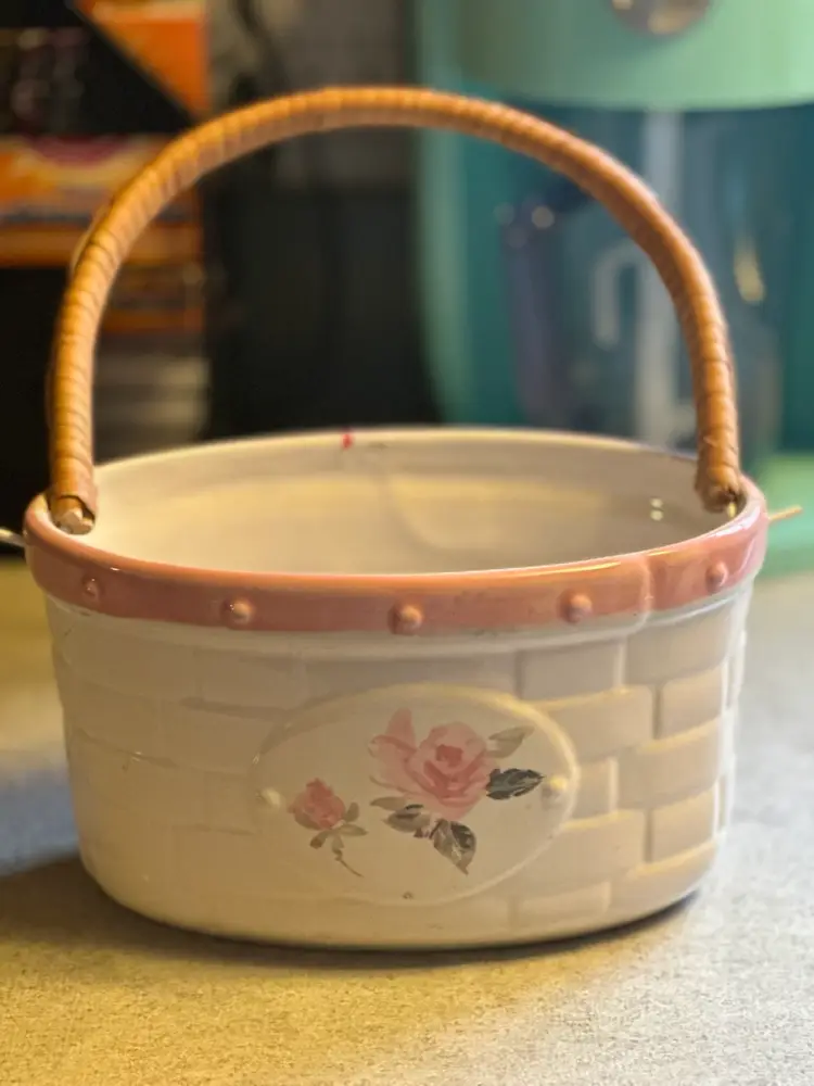 Ceramic basket with rattan handle by Pfaltzgraff, Tea Rose pattern.